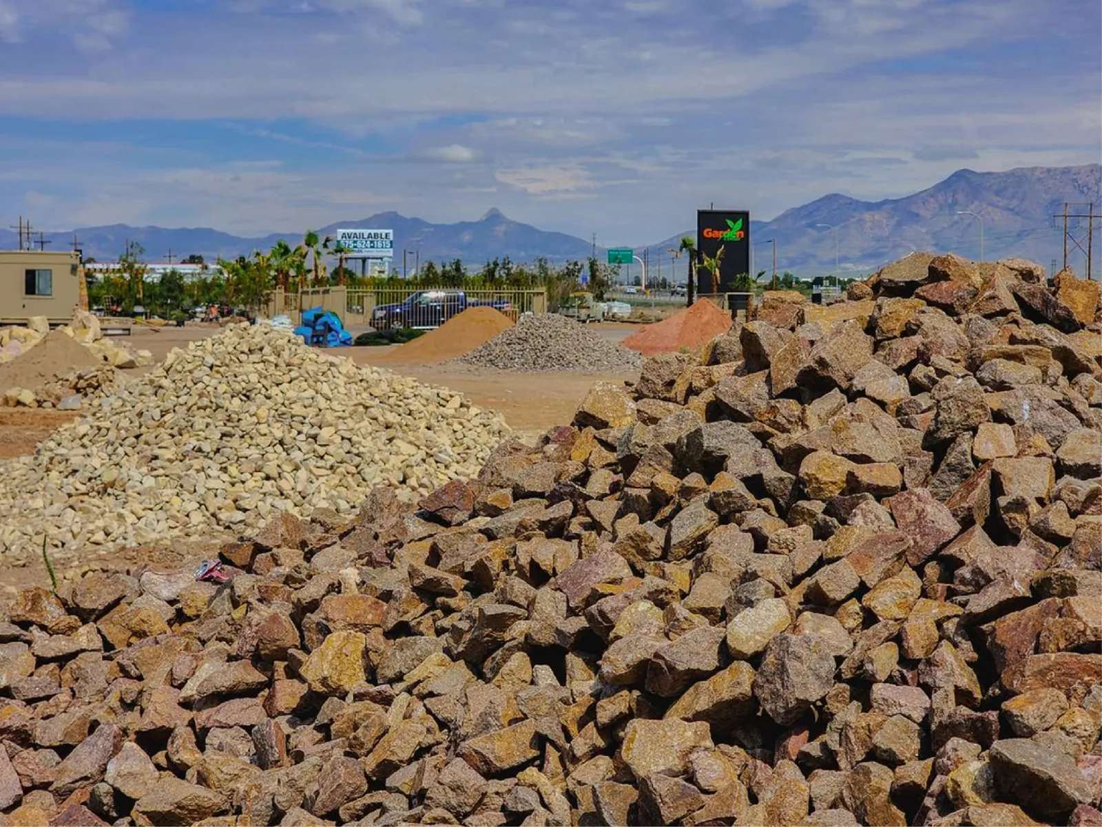 Garden Center of Las Cruces material yard with piles of decorative rock, gravel, and boulders in Las Cruces, NM Garden Center of Las Cruces material yard with piles of decorative rock, gravel, and boulders in Las Cruces, NM